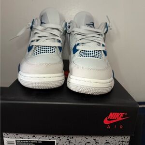 Nike Air Jordan 4 White and Blue Sneakers
